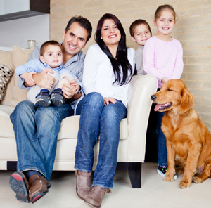 Family sitting on couch